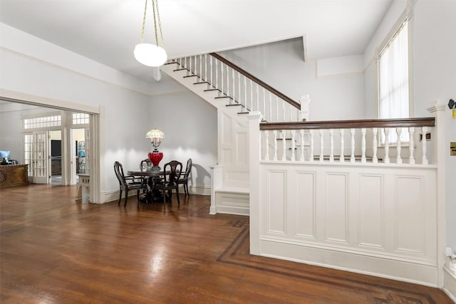 712 Lamar Ave, Crockett, TX 75835 - interior space with baseboards, wood finished floors, and french doors