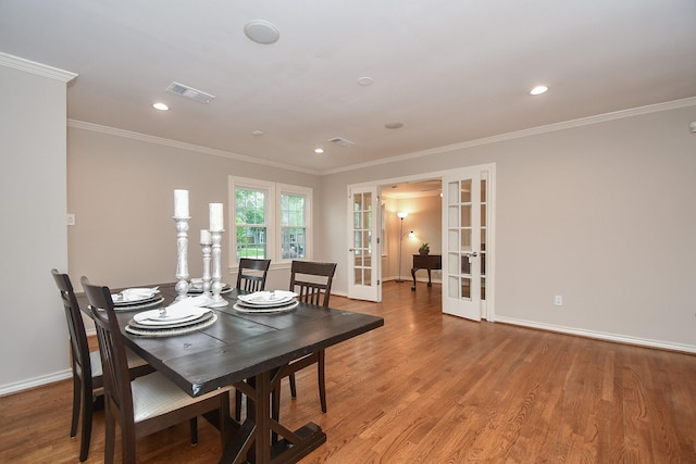 862 W 41st St, Houston, TX 77018 - dining area with crown molding, french doors, baseboards, and visible vents