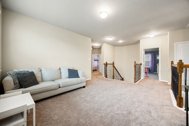 16875 Olympic National Dr, Humble, TX 77346 - carpeted living room featuring baseboards
