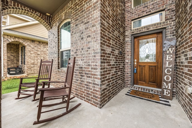 16875 Olympic National Dr, Humble, TX 77346 - view of exterior entry featuring brick siding