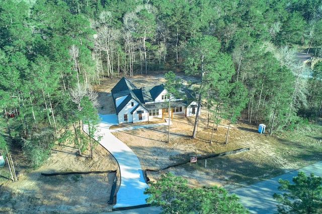 118 Ranger Rd, Huntsville, TX 77340 - view of subject property with a forest
