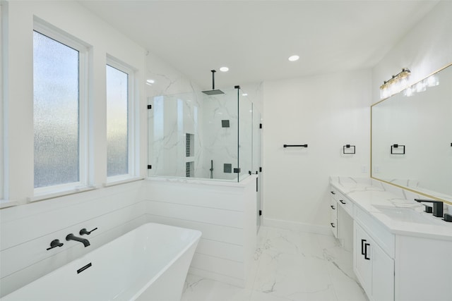 118 Ranger Rd, Huntsville, TX 77340 - bathroom with a marble finish shower, double vanity, marble look tile flooring, a freestanding tub, and recessed lighting