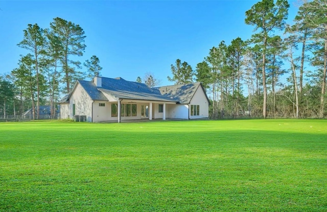 118 Ranger Rd, Huntsville, TX 77340 - view of front of property with a front yard and a chimney