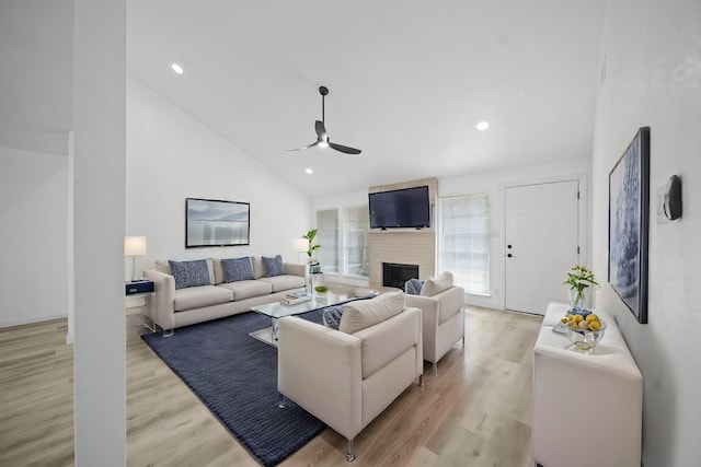 19207 Woodglen Dr, Katy, TX 77449 - living room with a fireplace, light wood-style flooring, ceiling fan, and recessed lighting