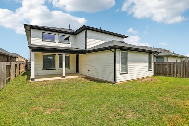 back of house with a patio area