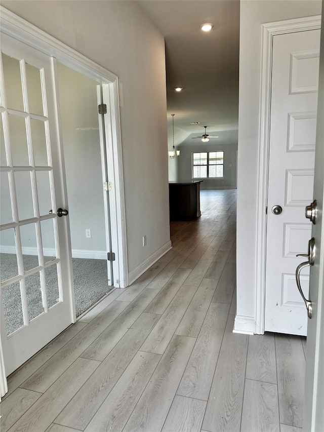 4301 Fenwick Rd, Texas City, TX 77591 - hall with recessed lighting, light wood-style flooring, and baseboards