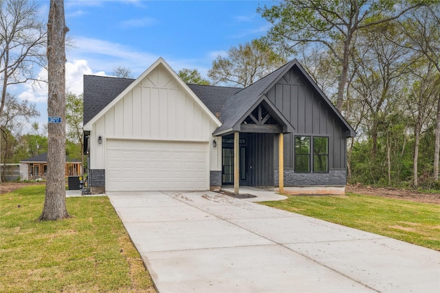 24717 Sligo St, Hempstead, TX 77445 - modern farmhouse with board and batten siding, driveway, a front yard, a garage, and a shingled roof