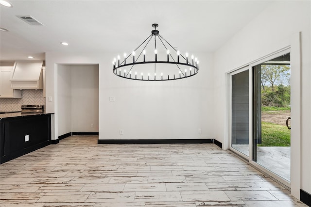 24717 Sligo St, Hempstead, TX 77445 - unfurnished dining area with baseboards, visible vents, recessed lighting, and a chandelier
