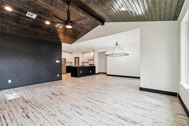 24717 Sligo St, Hempstead, TX 77445 - unfurnished living room with ceiling fan with notable chandelier, visible vents, wood ceiling, and baseboards
