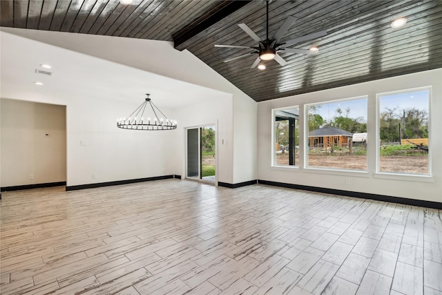 24717 Sligo St, Hempstead, TX 77445 - empty room featuring ceiling fan with notable chandelier, baseboards, light wood-style floors, visible vents, and vaulted ceiling with beams