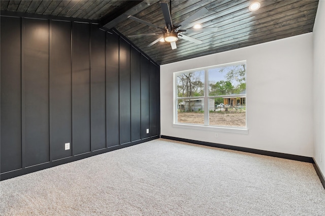 24717 Sligo St, Hempstead, TX 77445 - spare room with wooden ceiling, carpet, baseboards, ceiling fan, and vaulted ceiling with beams