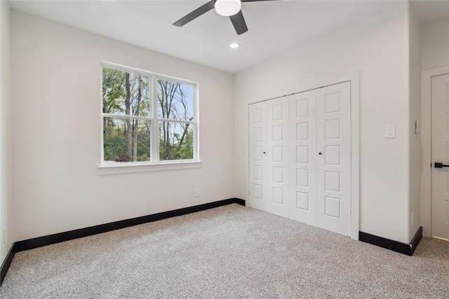 24717 Sligo St, Hempstead, TX 77445 - unfurnished bedroom with a closet, carpet floors, baseboards, and multiple windows