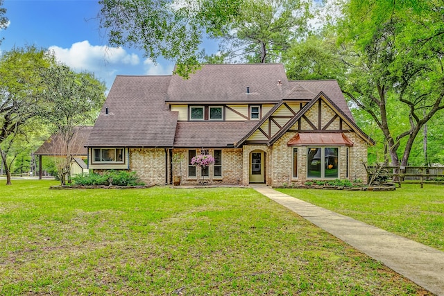 22814 Wren Ln, Tomball, TX 77377 - tudor house with a shingled roof