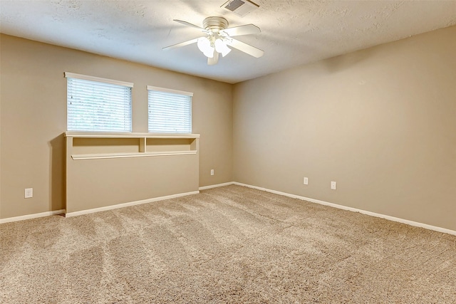 22814 Wren Ln, Tomball, TX 77377 - carpeted spare room with ceiling fan, baseboards, and a textured ceiling
