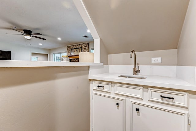 22814 Wren Ln, Tomball, TX 77377 - bar with a sink, ceiling fan, and recessed lighting