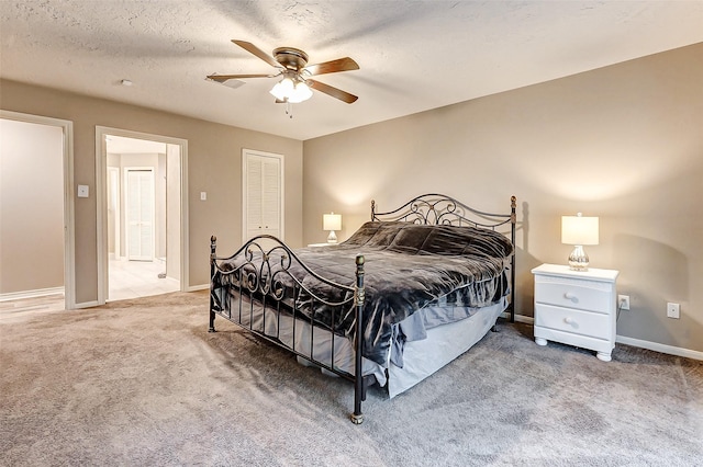 22814 Wren Ln, Tomball, TX 77377 - carpeted bedroom with baseboards, ceiling fan, and a closet