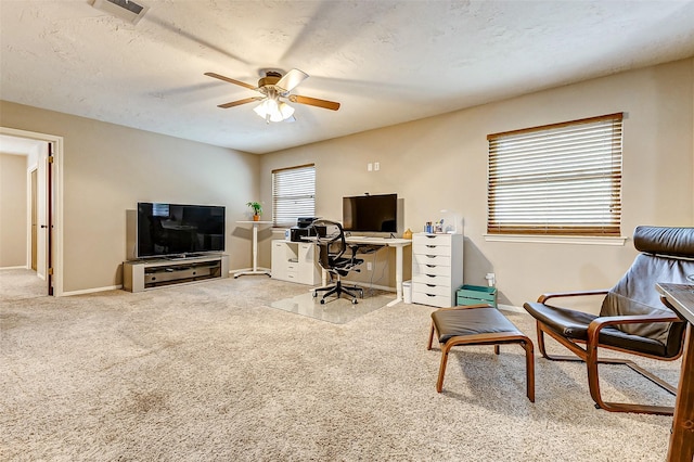 22814 Wren Ln, Tomball, TX 77377 - home office with ceiling fan, carpet flooring, and baseboards