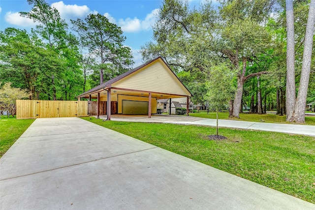 22814 Wren Ln, Tomball, TX 77377 - view of front of house featuring a gate, concrete driveway, and a garage