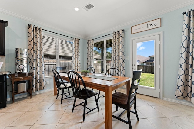 320 Cadela Dr, Montgomery, TX 77316 - dining space featuring light tile patterned floors, ornamental molding, baseboards, and visible vents