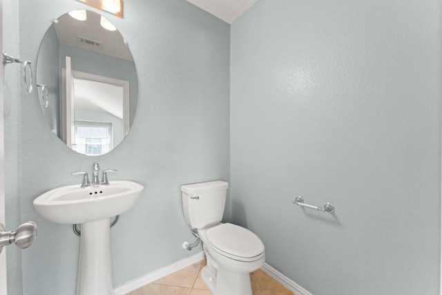 320 Cadela Dr, Montgomery, TX 77316 - bathroom featuring baseboards, visible vents, tile patterned floors, and toilet