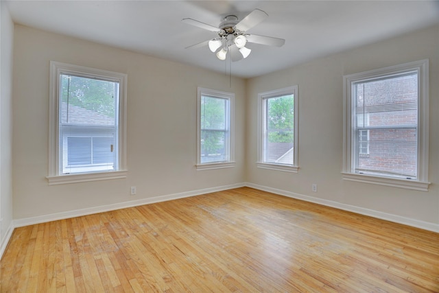 2348 Sheridan St, Houston, TX 77030 - unfurnished room featuring light wood finished floors, baseboards, and ceiling fan