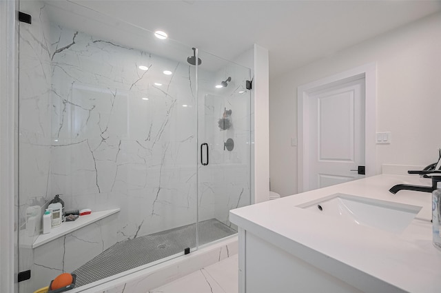 3734 Windswept Dr, Montgomery, TX 77356 - full bathroom with a marble finish shower, double vanity, and toilet