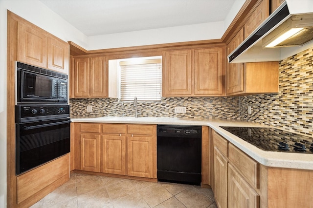 6106 Greenmont Dr, Houston, TX 77092 - kitchen with black appliances, exhaust hood, decorative backsplash, and light countertops