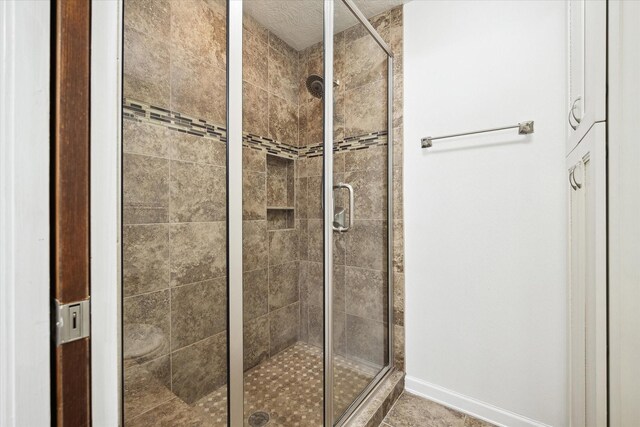 6106 Greenmont Dr, Houston, TX 77092 - full bath featuring a shower stall and baseboards