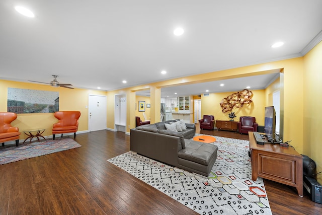 7575 Katy Fwy Unit 4, Houston, TX 77024 - living room with wood finished floors, a ceiling fan, crown molding, baseboards, and recessed lighting