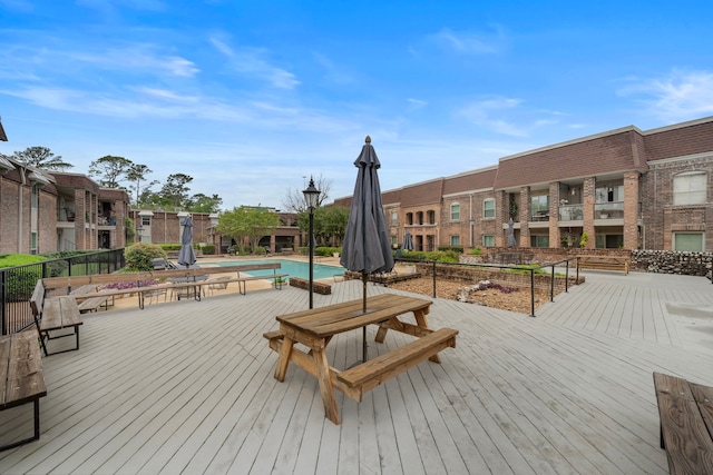 7575 Katy Fwy Unit 4, Houston, TX 77024 - deck featuring a community pool and a residential view