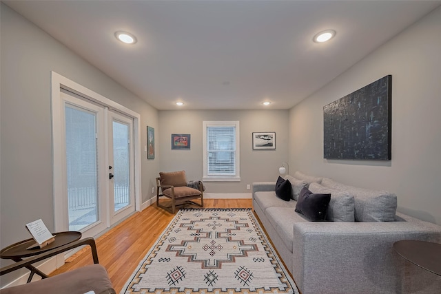 2311 Branard St, Houston, TX 77098 - living area featuring baseboards, recessed lighting, and light wood-style flooring