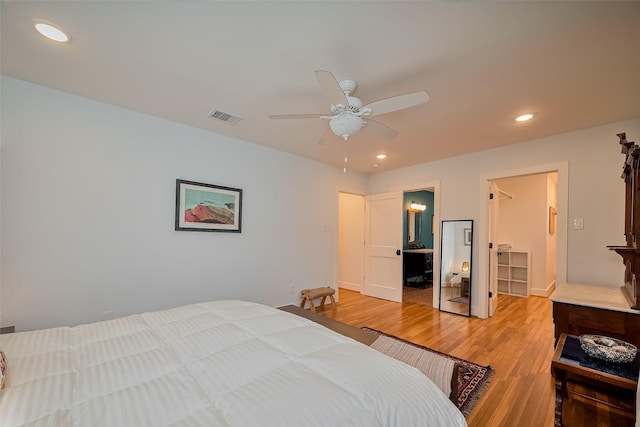 2311 Branard St, Houston, TX 77098 - bedroom with light wood-style floors, ceiling fan, baseboards, visible vents, and recessed lighting