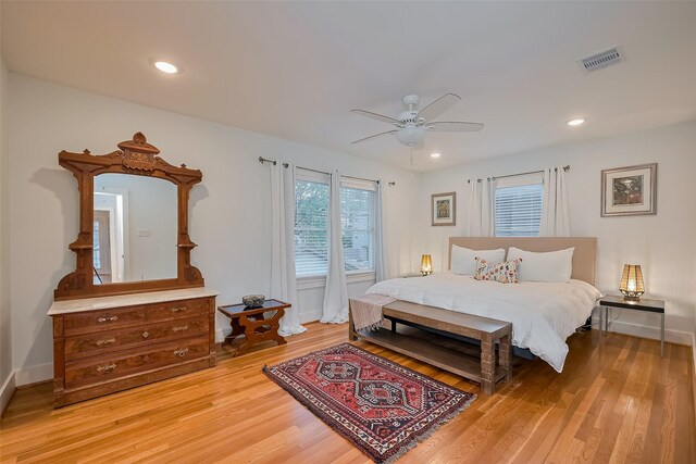 2311 Branard St, Houston, TX 77098 - bedroom featuring baseboards, a ceiling fan, visible vents, and light wood-style floors