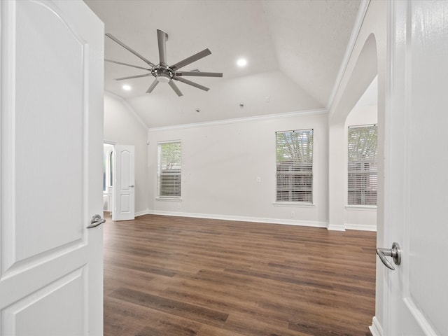 unfurnished room featuring lofted ceiling, ceiling fan, ornamental molding, dark wood-style flooring, and recessed lighting