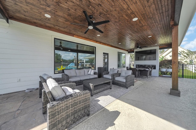 4730 Pitts Rd, Katy, TX 77493 - view of patio / terrace featuring an outdoor living space, a ceiling fan, fence, and outdoor dining space
