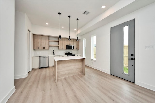 4601 White Rock St, Houston, TX 77051 - kitchen featuring visible vents, open shelves, a sink, light countertops, and appliances with stainless steel finishes
