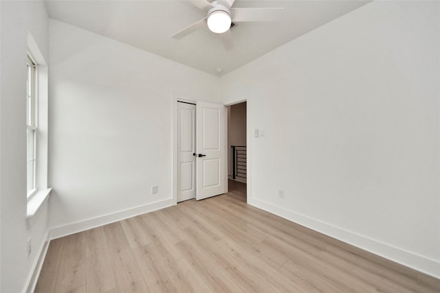 4601 White Rock St, Houston, TX 77051 - empty room with light wood-style flooring, baseboards, and a ceiling fan