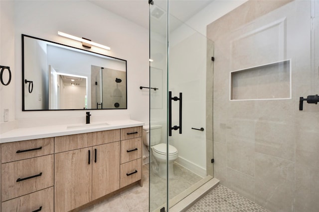 4601 White Rock St, Houston, TX 77051 - full bath featuring vanity, baseboards, a stall shower, tile patterned flooring, and toilet