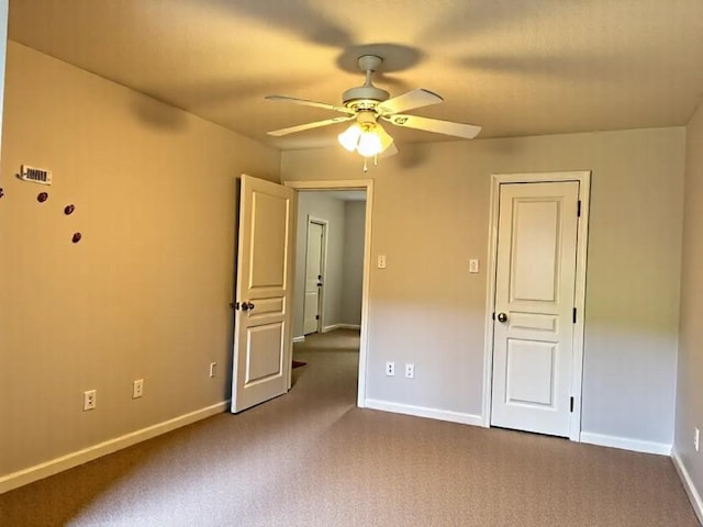 2914 Renoir, Sugar Land, TX 77479 - unfurnished bedroom featuring dark colored carpet, baseboards, and a ceiling fan