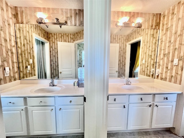 2914 Renoir, Sugar Land, TX 77479 - bathroom featuring vanity and wallpapered walls