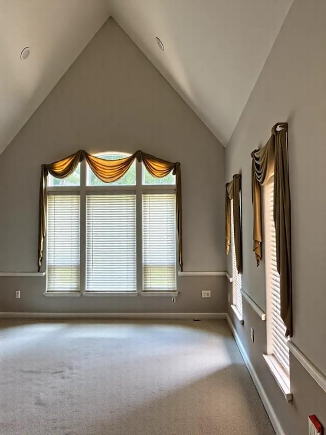2914 Renoir, Sugar Land, TX 77479 - spare room with lofted ceiling, carpet, healthy amount of natural light, and baseboards