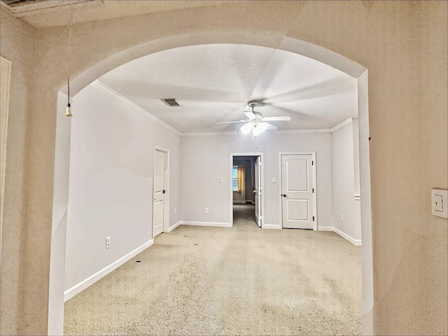 2914 Renoir, Sugar Land, TX 77479 - unfurnished room featuring ceiling fan, arched walkways, ornamental molding, baseboards, and carpet flooring