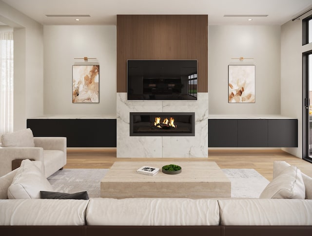 963 W 41st St, Houston, TX 77018 - living room with a fireplace, recessed lighting, and wood finished floors
