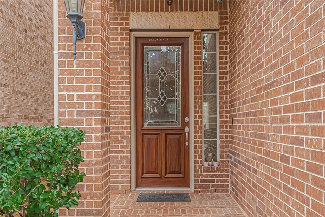 14515 Basalt Ln, Houston, TX 77077 - entrance to property featuring brick siding