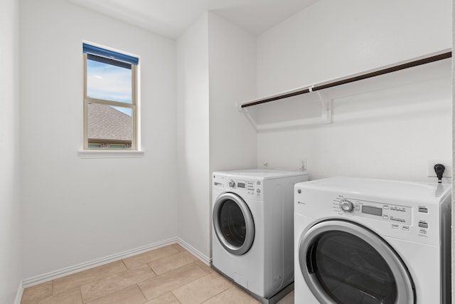 32734 Harvest Valley Dr, Brookshire, TX 77423 - laundry area featuring washing machine and dryer and baseboards