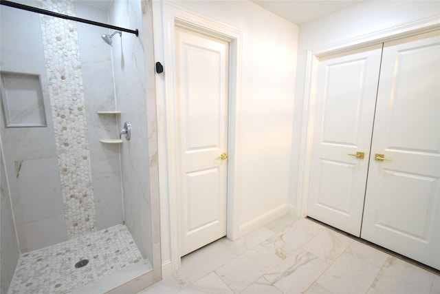 42 County Road 5102l, Cleveland, TX 77327 - full bathroom with marble finish floors, a shower stall, and baseboards