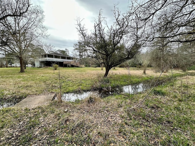 view of yard featuring a deck