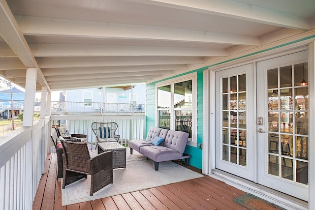 16519 Mansvelt Rd, Jamaica Beach, TX 77554 - wooden terrace with outdoor lounge area and french doors