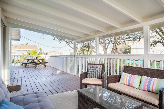 16519 Mansvelt Rd, Jamaica Beach, TX 77554 - wooden terrace with an outdoor living space