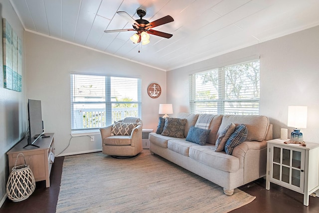 16519 Mansvelt Rd, Jamaica Beach, TX 77554 - living room featuring vaulted ceiling, crown molding, a ceiling fan, wood finished floors, and baseboards